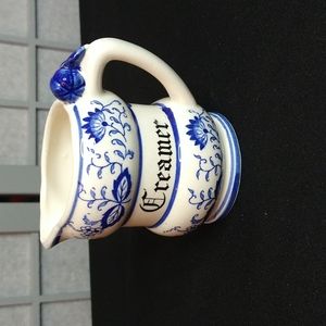 Blue and white onion creamer dish